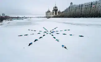Открытый урок по скандинавской ходьбе для пенсионеров в Астане