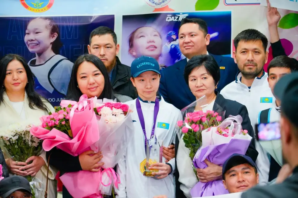 Историческая победа спустя 20 лет: ставшая чемпионкой мира столичная таэквондистка вернулась на родину (4)