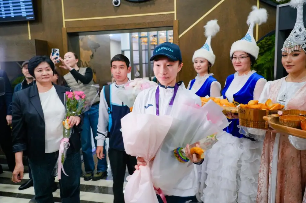 Историческая победа спустя 20 лет: ставшая чемпионкой мира столичная таэквондистка вернулась на родину (6)